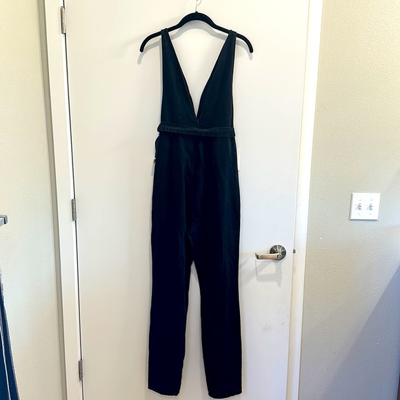 Black Denim low cut, sleeveless jumpsuit with western inspired belt - Picture 4 of 5
